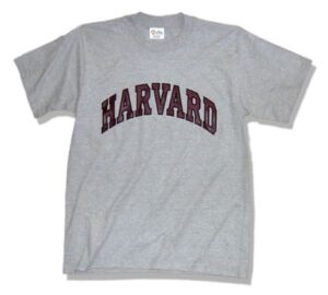 A harvard t-shirt with the word " harvard " on it.