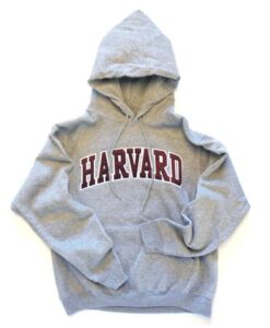 A harvard sweatshirt is shown with the word " harvard ".